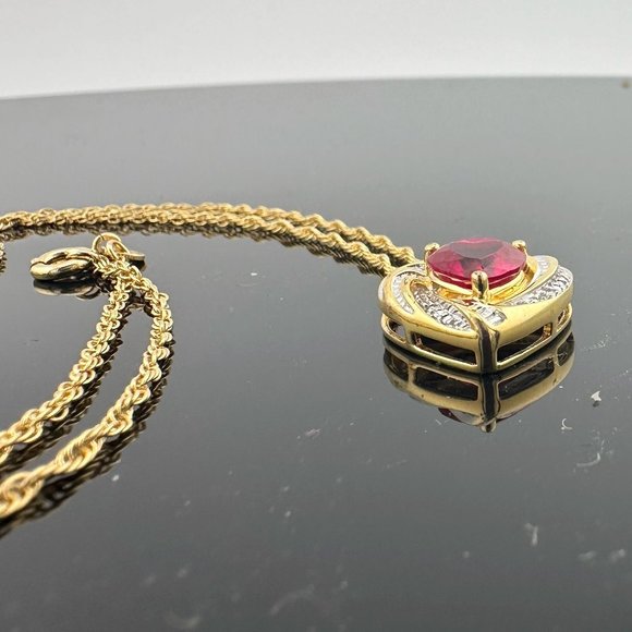 Elegant and Eye Catching Ruby Heart with Round and Baguette White Sapphires - Picture 8 of 11